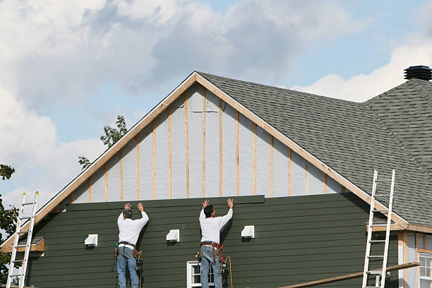 Professional Vinyl Siding technician working in Grove City, OH